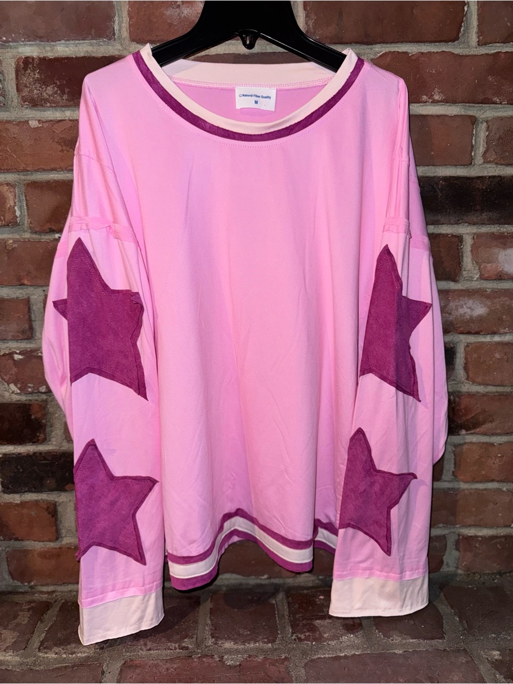 Pink Long-Sleeve Top with Purple Star Sleeves